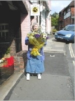 Galea Parsons with flowers for Liz Page. Just to say thank you for all your hard work.