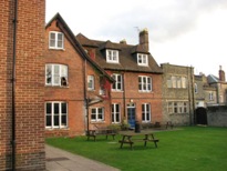 0667 - Back of Boarding House - note chair propping up window