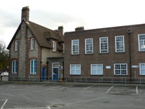 0194 - side of the Boarding House and the old Sixth Form block.  One of the rooms in the latter is used for training Nail Technicians